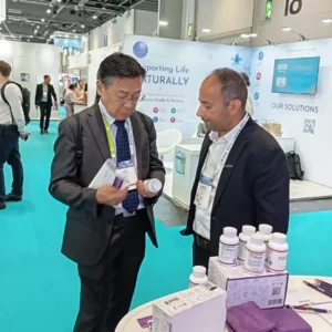 Healthcare professionals reviewing Prolistem research at ESHRE 2026